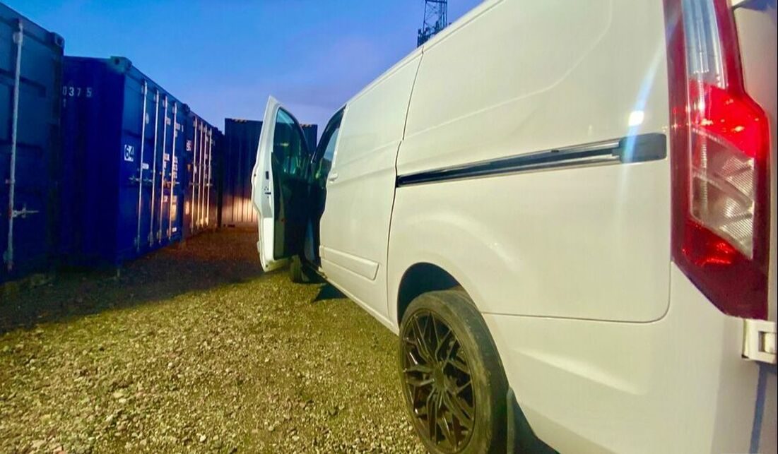 van on a self storage facility