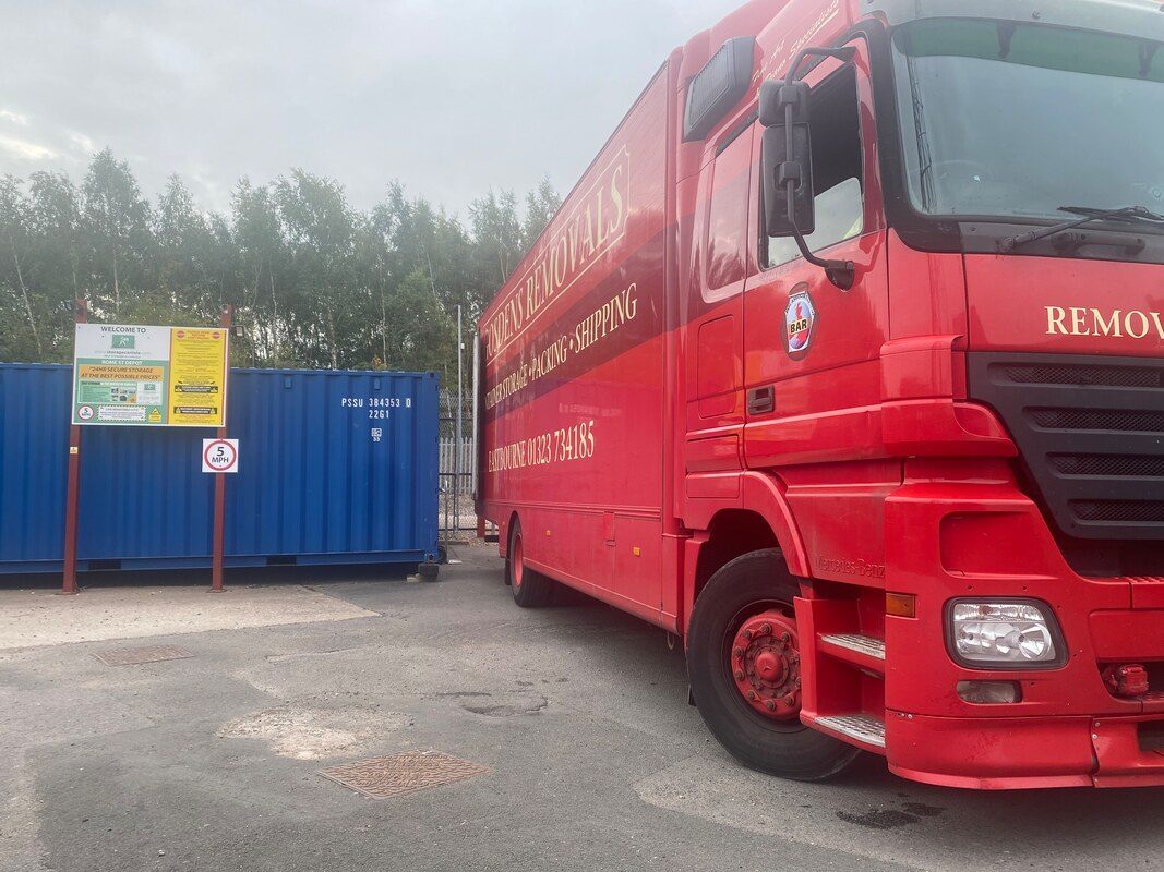 a removals lorry delivering to a storage unit